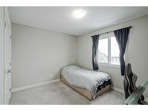 34 Mahogany Close Se, Calgary, AB - Indoor Photo Showing Bedroom