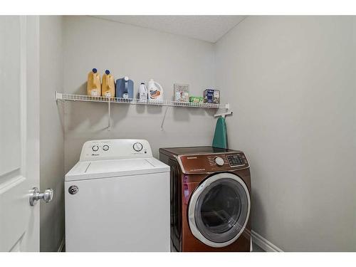 34 Mahogany Close Se, Calgary, AB - Indoor Photo Showing Laundry Room