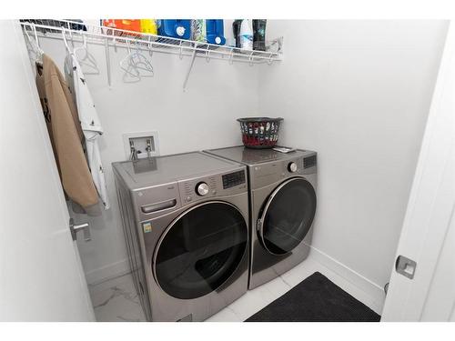 125 South Shore View, Chestermere, AB - Indoor Photo Showing Laundry Room