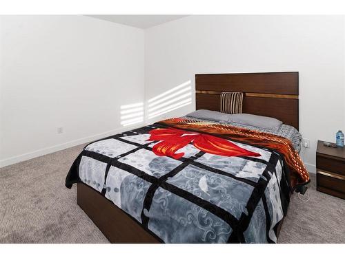 125 South Shore View, Chestermere, AB - Indoor Photo Showing Bedroom