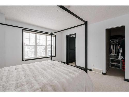 224 Cranberry Park Se, Calgary, AB - Indoor Photo Showing Bedroom