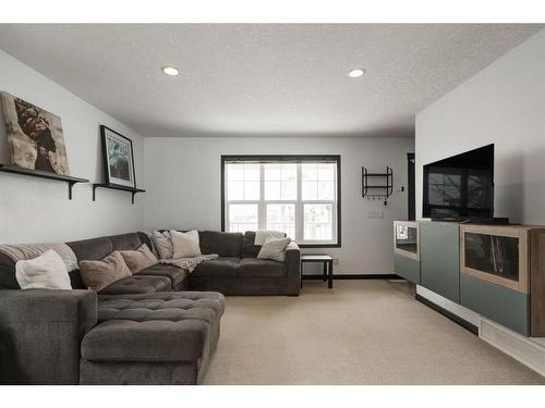 224 Cranberry Park Se, Calgary, AB - Indoor Photo Showing Living Room