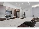 312-4303 1 Street Ne, Calgary, AB  - Indoor Photo Showing Kitchen With Stainless Steel Kitchen 