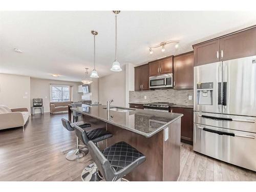 257 Copperpond Landing Se, Calgary, AB - Indoor Photo Showing Kitchen With Upgraded Kitchen