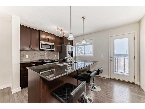 257 Copperpond Landing Se, Calgary, AB - Indoor Photo Showing Kitchen With Upgraded Kitchen