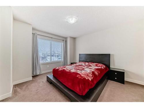 257 Copperpond Landing Se, Calgary, AB - Indoor Photo Showing Bedroom