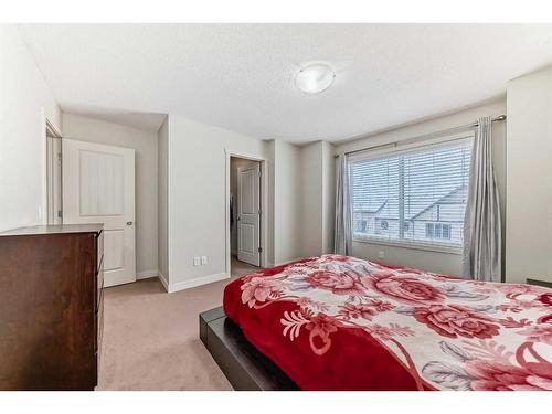 257 Copperpond Landing Se, Calgary, AB - Indoor Photo Showing Bedroom