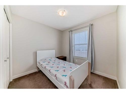 257 Copperpond Landing Se, Calgary, AB - Indoor Photo Showing Bedroom