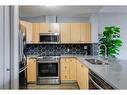 905-1053 10 Street Sw, Calgary, AB  - Indoor Photo Showing Kitchen With Stainless Steel Kitchen With Double Sink 