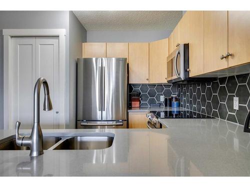 905-1053 10 Street Sw, Calgary, AB - Indoor Photo Showing Kitchen With Stainless Steel Kitchen With Double Sink