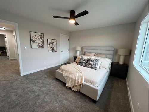 113 Gray Close, Sylvan Lake, AB - Indoor Photo Showing Bedroom