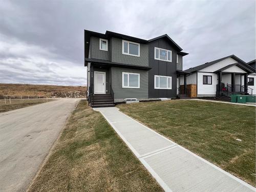 113 Gray Close, Sylvan Lake, AB - Outdoor With Facade