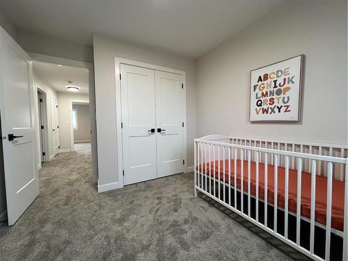 113 Gray Close, Sylvan Lake, AB - Indoor Photo Showing Bedroom