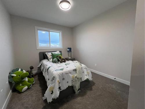 113 Gray Close, Sylvan Lake, AB - Indoor Photo Showing Bedroom