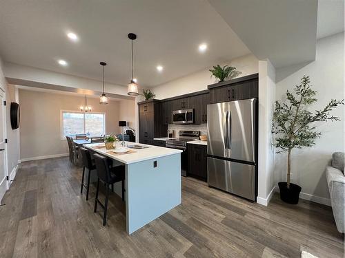 113 Gray Close, Sylvan Lake, AB - Indoor Photo Showing Kitchen With Upgraded Kitchen