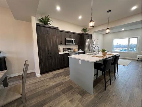 113 Gray Close, Sylvan Lake, AB - Indoor Photo Showing Kitchen With Upgraded Kitchen