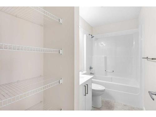 26 Luxstone Point Sw, Airdrie, AB - Indoor Photo Showing Bathroom