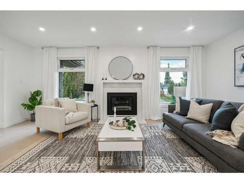 507 Cantrell Drive Sw, Calgary, AB - Indoor Photo Showing Living Room With Fireplace