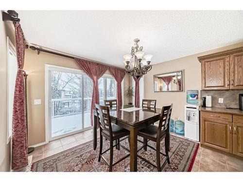 47 Panamount Heights Nw, Calgary, AB - Indoor Photo Showing Dining Room