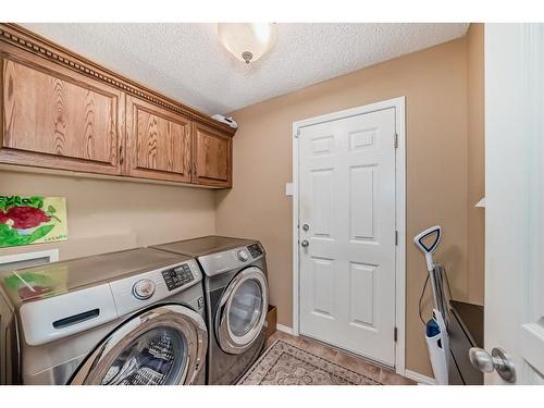 47 Panamount Heights Nw, Calgary, AB - Indoor Photo Showing Laundry Room