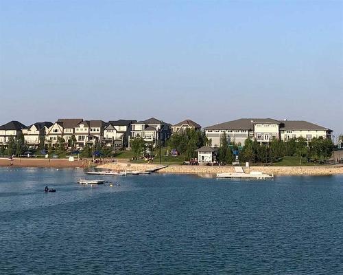 83 Mahogany Way Se, Calgary, AB - Outdoor With Body Of Water With View