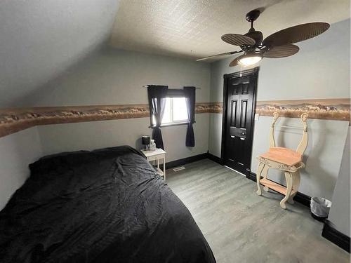 2130 19 Avenue, Didsbury, AB - Indoor Photo Showing Bedroom