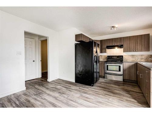 804 44 Street Se, Calgary, AB - Indoor Photo Showing Kitchen With Double Sink