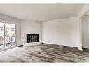 804 44 Street Se, Calgary, AB  - Indoor Photo Showing Living Room With Fireplace 