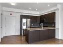 403-214 Sherwood Square Nw, Calgary, AB  - Indoor Photo Showing Kitchen With Stainless Steel Kitchen 