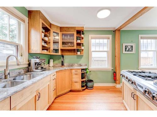 436 Muskrat Street, Banff, AB - Indoor Photo Showing Kitchen With Double Sink