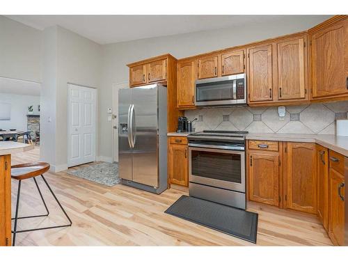 11 Oakmount Way Sw, Calgary, AB - Indoor Photo Showing Kitchen With Stainless Steel Kitchen