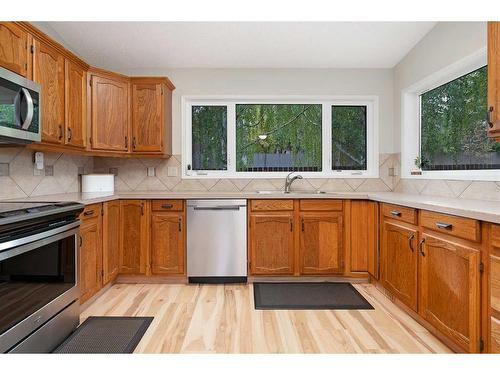 11 Oakmount Way Sw, Calgary, AB - Indoor Photo Showing Kitchen With Double Sink