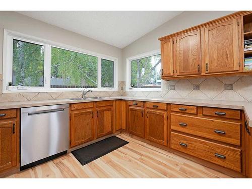 11 Oakmount Way Sw, Calgary, AB - Indoor Photo Showing Kitchen With Double Sink