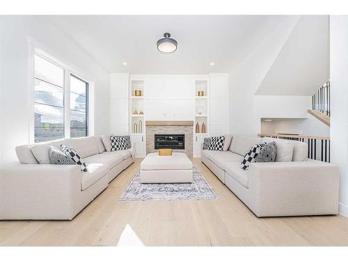 23 Watercrest Gate, Chestermere, AB - Indoor Photo Showing Living Room With Fireplace