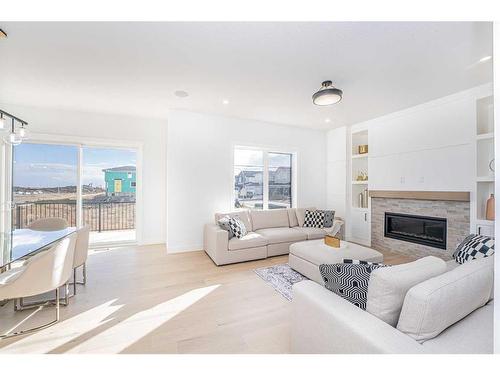 23 Watercrest Gate, Chestermere, AB - Indoor Photo Showing Living Room With Fireplace