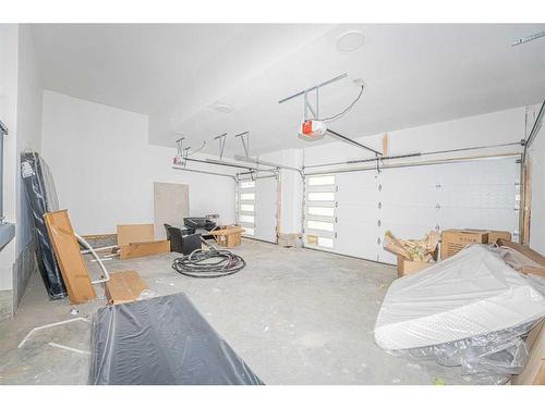 23 Watercrest Gate, Chestermere, AB - Indoor Photo Showing Garage