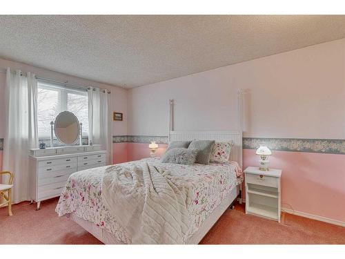 20 Riverbrook Place Se, Calgary, AB - Indoor Photo Showing Bedroom