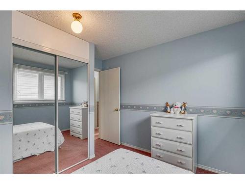 20 Riverbrook Place Se, Calgary, AB - Indoor Photo Showing Bedroom