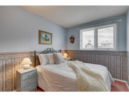 20 Riverbrook Place Se, Calgary, AB - Indoor Photo Showing Bedroom