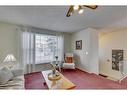 20 Riverbrook Place Se, Calgary, AB  - Indoor Photo Showing Living Room 