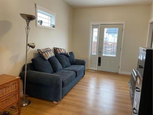 226 Harvest Hills Boulevard, Stavely, AB - Indoor Photo Showing Living Room