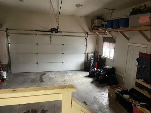 226 Harvest Hills Boulevard, Stavely, AB - Indoor Photo Showing Garage