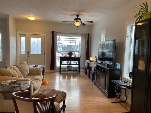 226 Harvest Hills Boulevard, Stavely, AB - Indoor Photo Showing Living Room