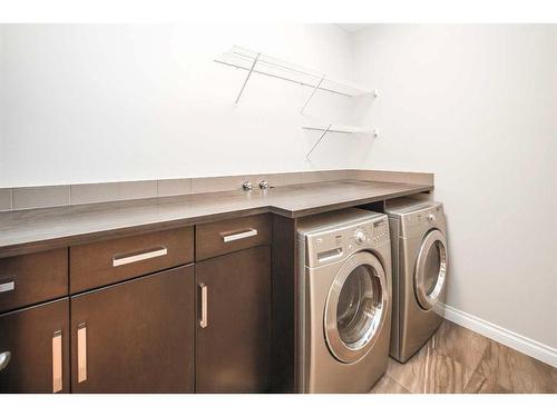 35 Aspen Summit Mount Sw, Calgary, AB - Indoor Photo Showing Laundry Room