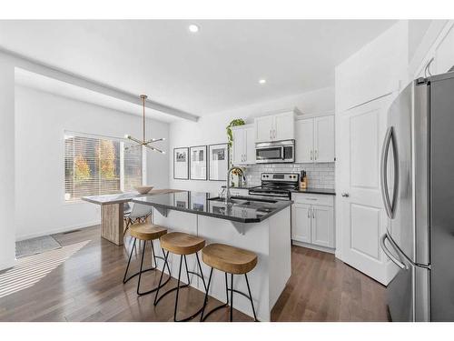 277 Willow Park, Cochrane, AB - Indoor Photo Showing Kitchen With Upgraded Kitchen