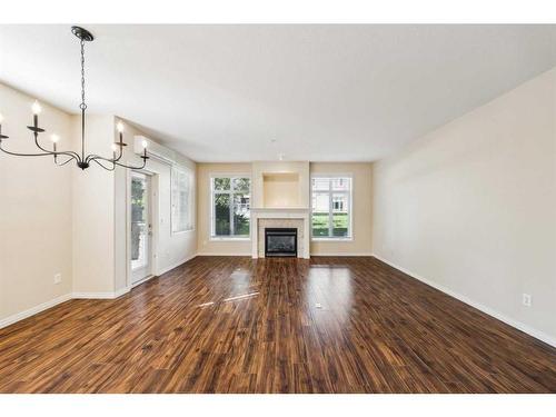 3104 Lake Fraser Court Se, Calgary, AB - Indoor Photo Showing Living Room With Fireplace