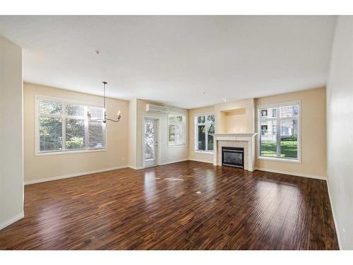 3104 Lake Fraser Court Se, Calgary, AB - Indoor Photo Showing Living Room With Fireplace