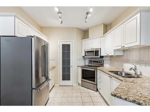 3104 Lake Fraser Court Se, Calgary, AB - Indoor Photo Showing Kitchen With Stainless Steel Kitchen With Double Sink