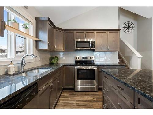 71 Ravenstern Point Se, Airdrie, AB - Indoor Photo Showing Kitchen With Double Sink