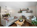 71 Ravenstern Point Se, Airdrie, AB  - Indoor Photo Showing Living Room 